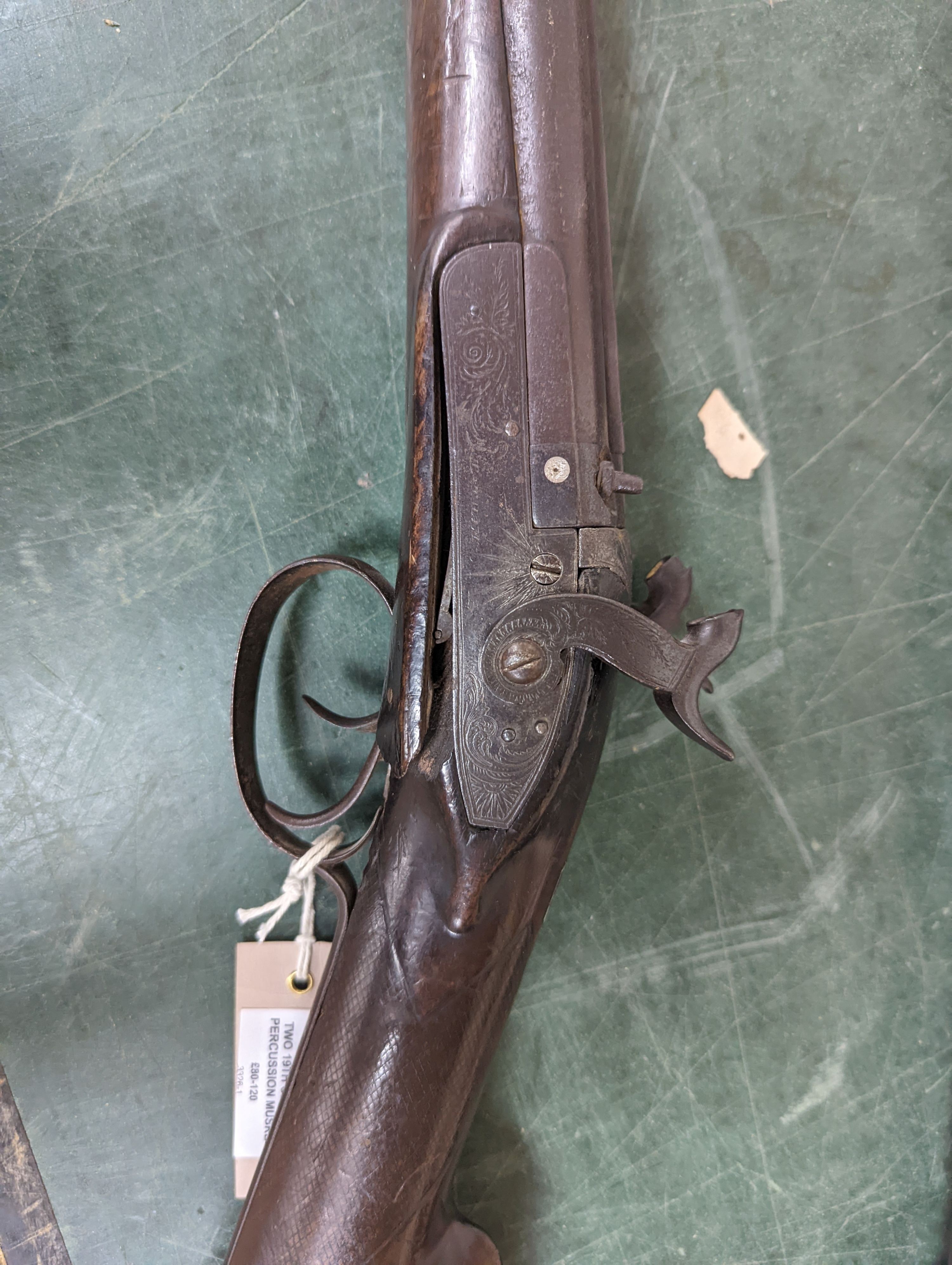 Two 19th century percussion muskets, 103cm. max., one double-barrelled